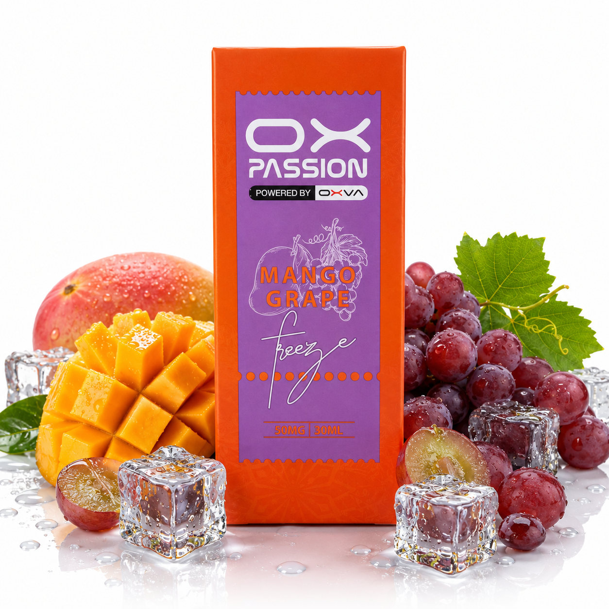 An orange and purple OX PASSION Freeze vape juice box labeled Mango Grape flavor, surrounded by fresh mango slices, red grapes, a mango pit, and clear ice cubes on a white reflective surface.
