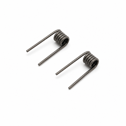 Pair of LEO COILS AND COTTON LEO ALIEN DUAL CORE MTL coils, 0.65Ω, for vaping devices.