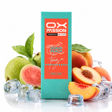 A 30ml tumbler box of OX Passion 'Freeze' passion fruit and peach flavor vape liquid, styled with fresh green guavas, sliced peaches, and ice cubes on a reflective white surface.