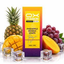 A 30ml box of OX Passion Pineapple Mango Grape e-liquid, styled with fresh pineapple, sliced mango, grapes, and ice cubes on a reflective white surface.
