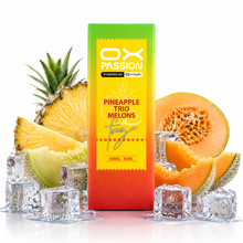 A 50ml box of OX Passion Pineapple Trio Melons e-liquid stands upright in the center, surrounded by fresh pineapple slices, cantaloupe melon pieces, and clear ice cubes on a white background.