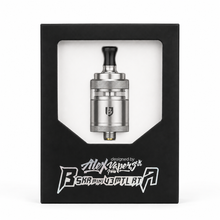 A silver and black Alex Vapers BRR Mini DTL A vape tank displayed inside its black retail packaging box with a clear window.